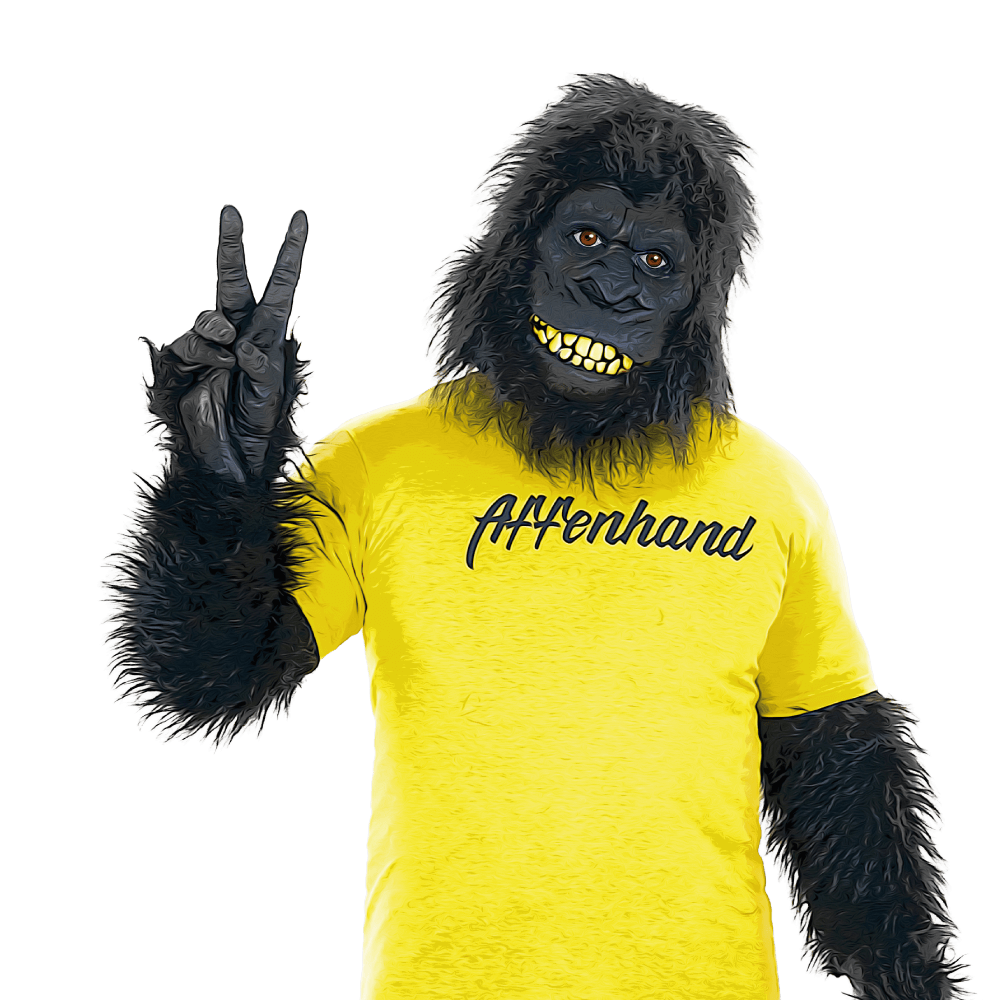 Neue-Produkte-Affenhand Affenhand® Maskottchen mit gelbem Shirt und Peace-Zeichen – das Symbol für Stärke, Spaß und Community bei Affenhand.